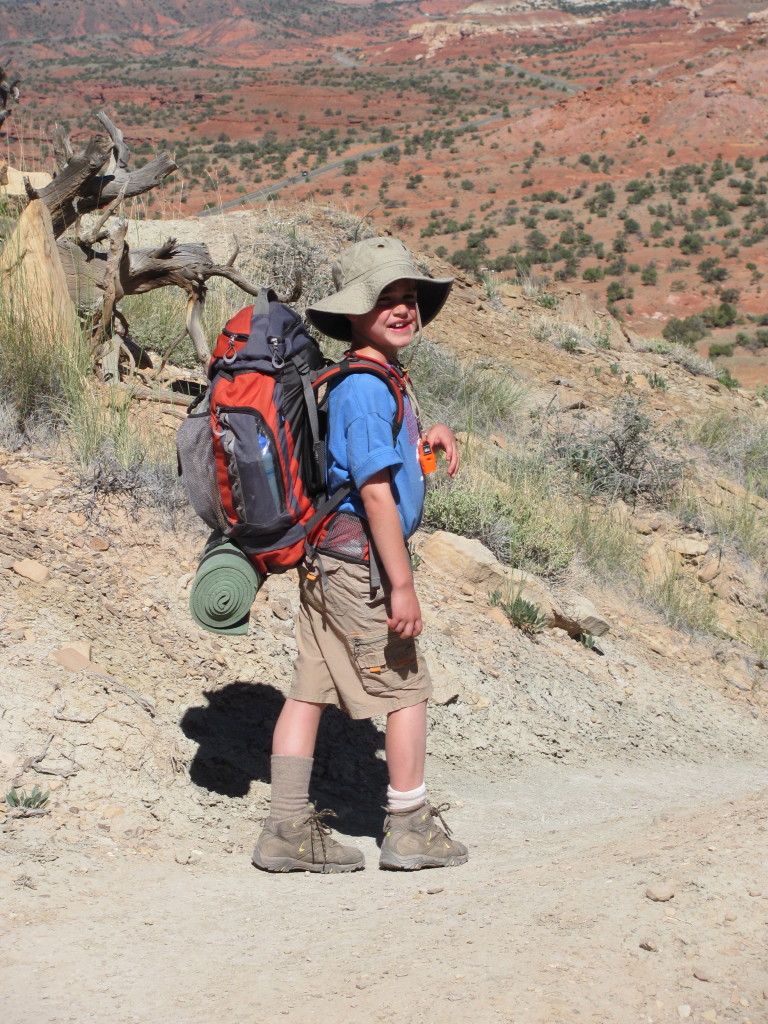Backpacking Capitol Reef: Garrett Heading Back Down the Chimney Rock Trail