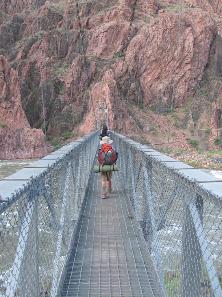 Grand Canyon Rim to Rim with kids: Garrett Crossing the Colorado River on the Silver Bridge