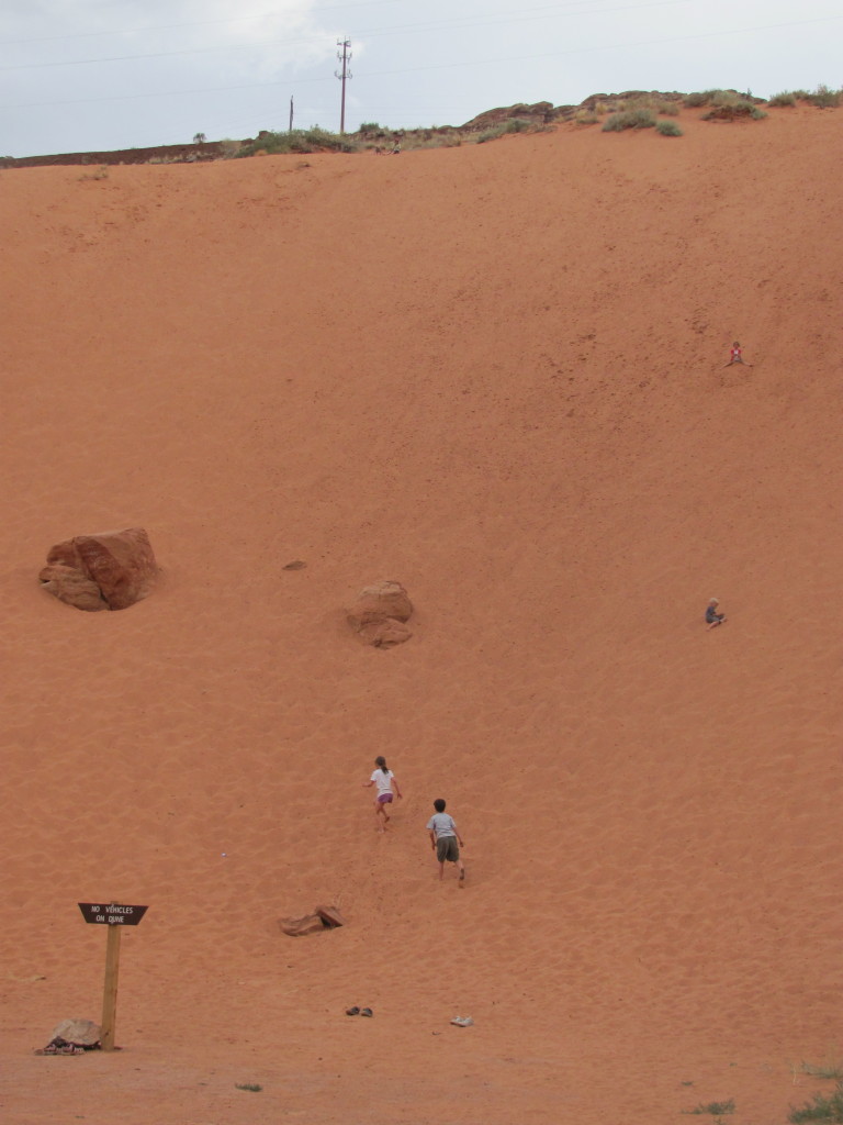 Climbing the Sand Dunes in Moab, Utah