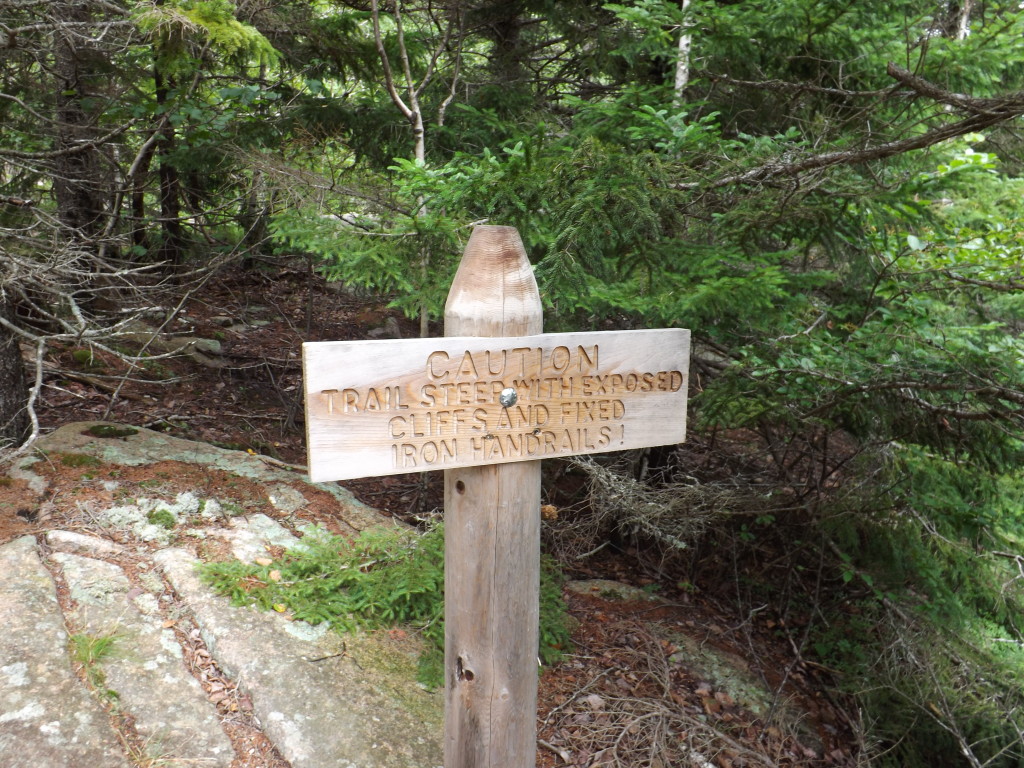 Caution! Climbing ahead on the Beehive Trail in Acadia National Park